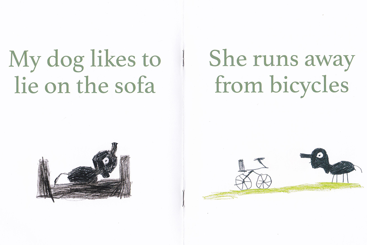 Page from book with drawing and text about Nelly the dog