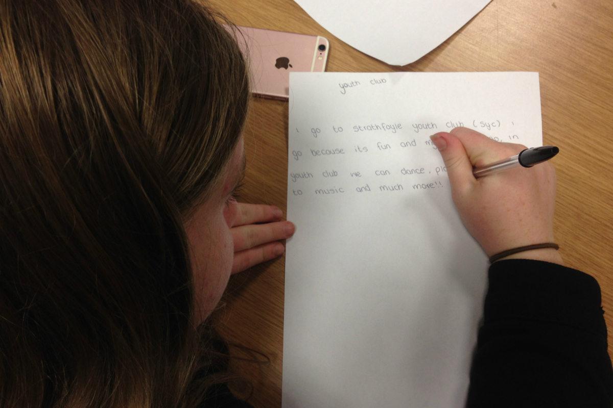 Participant during a workshop at Strathfoyle Library with writer Mary Branley