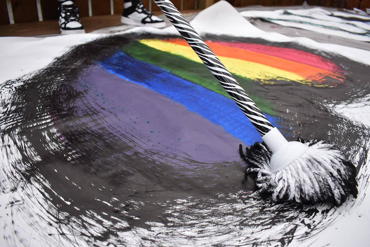 LGBTQIA+ art project: Painting with a mop!