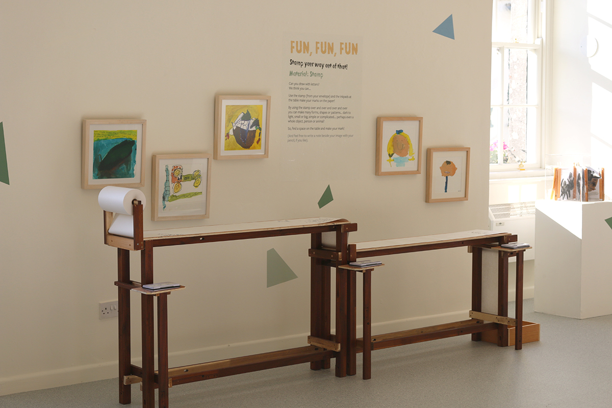 The stamping press as part of interactive exhibition by Kids' Own